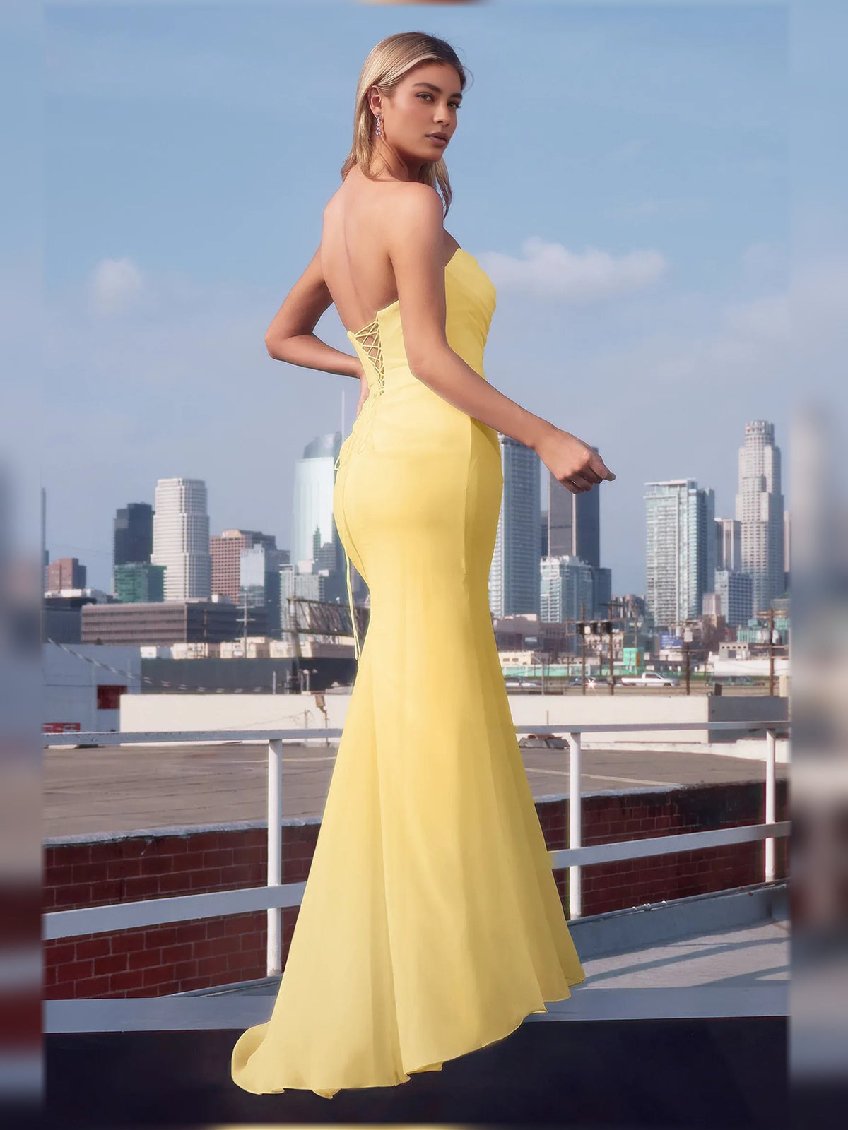 Strapless ruched formal dress in pale yellow, sleeveless fitted floor-length