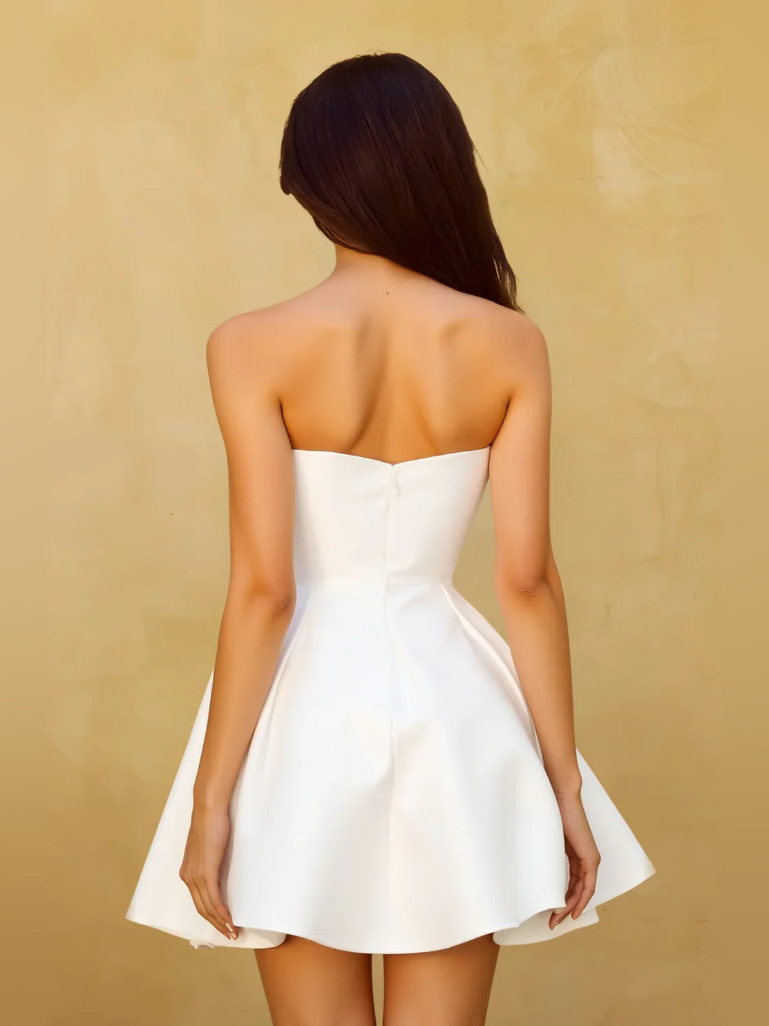 White satin strapless A-line mini dress, open back view