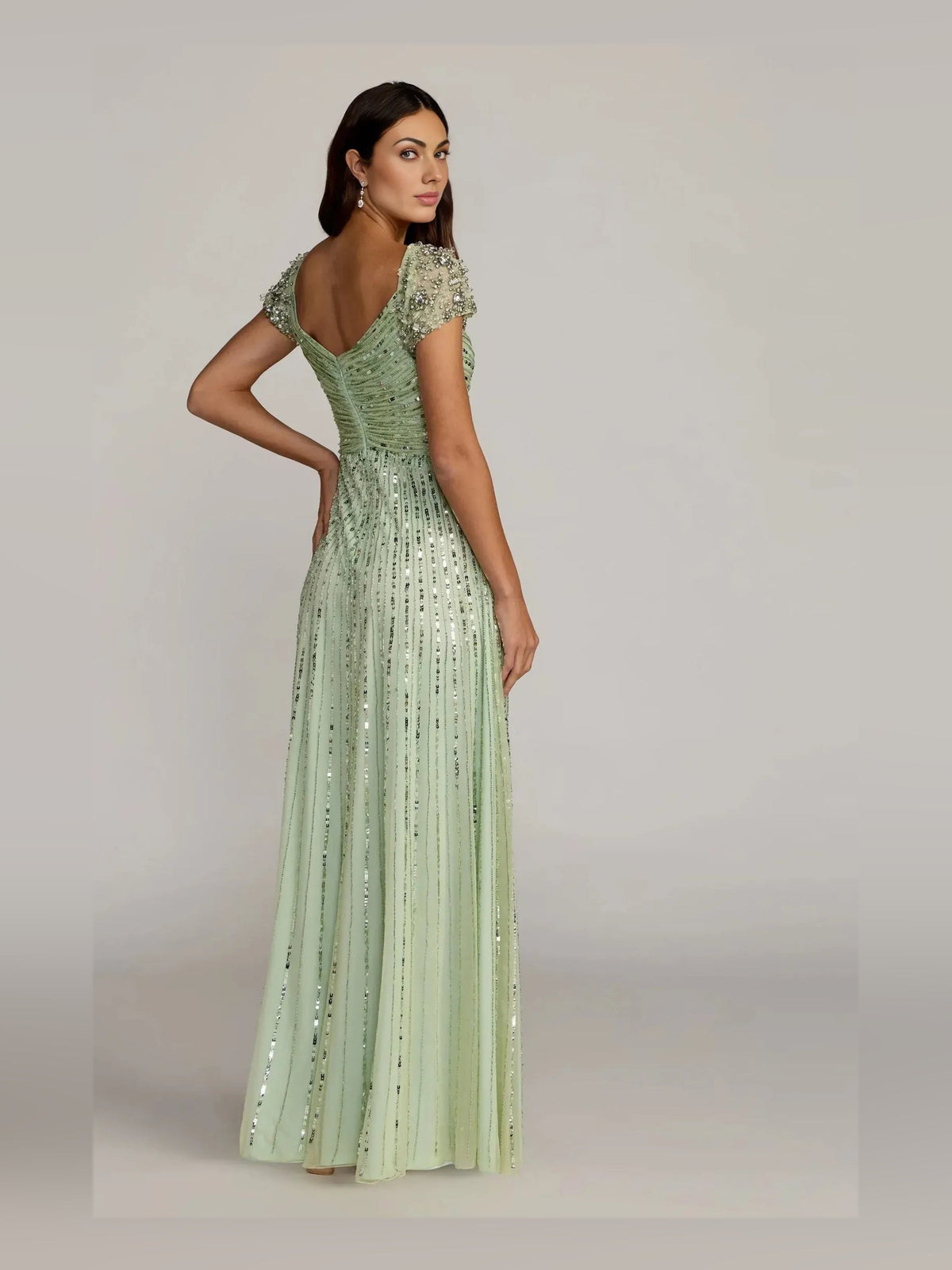 Mint green formal dress with sweetheart neckline and beaded bodice, floor length