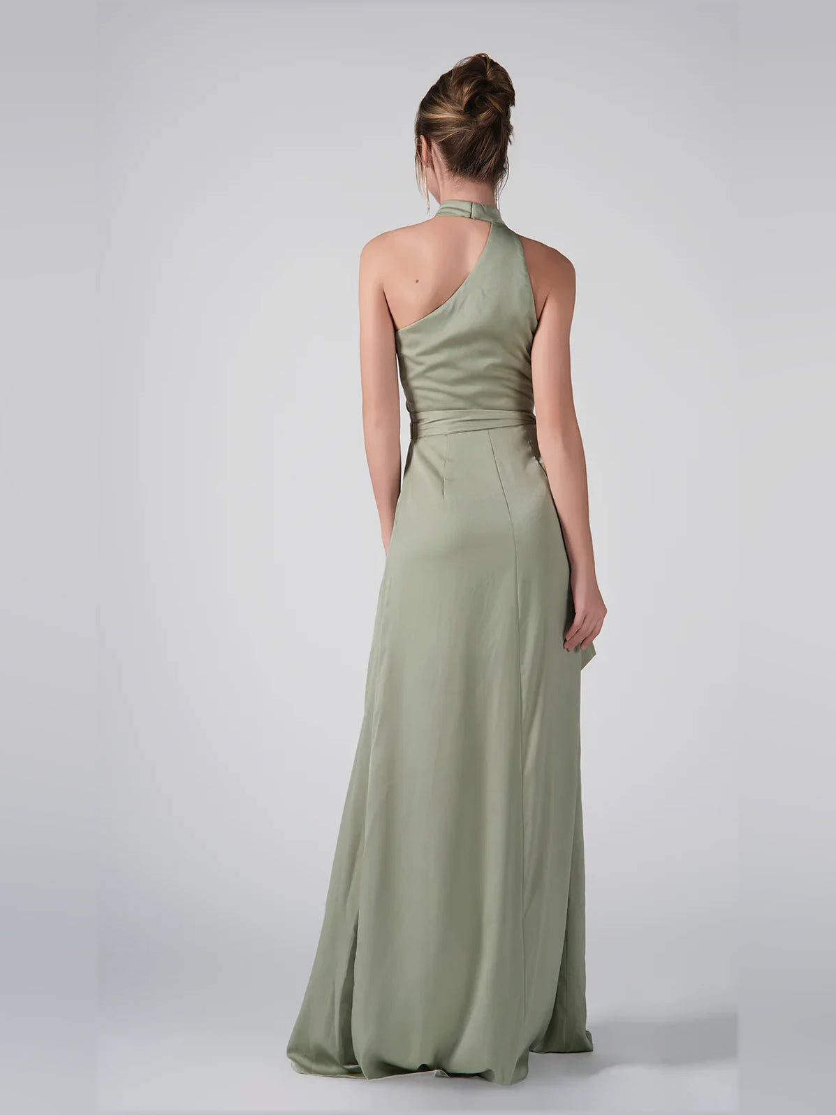 Dusty sage halter formal dress, open back and long skirt with front slit.