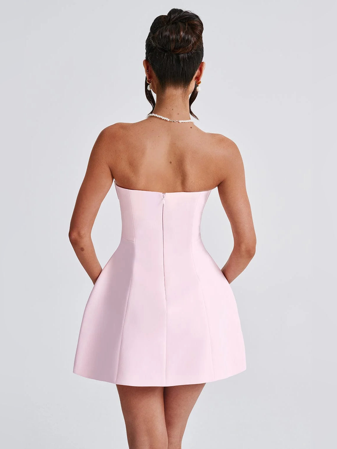 Blush backless strapless fit-and-flare mini dress with structured corset seams