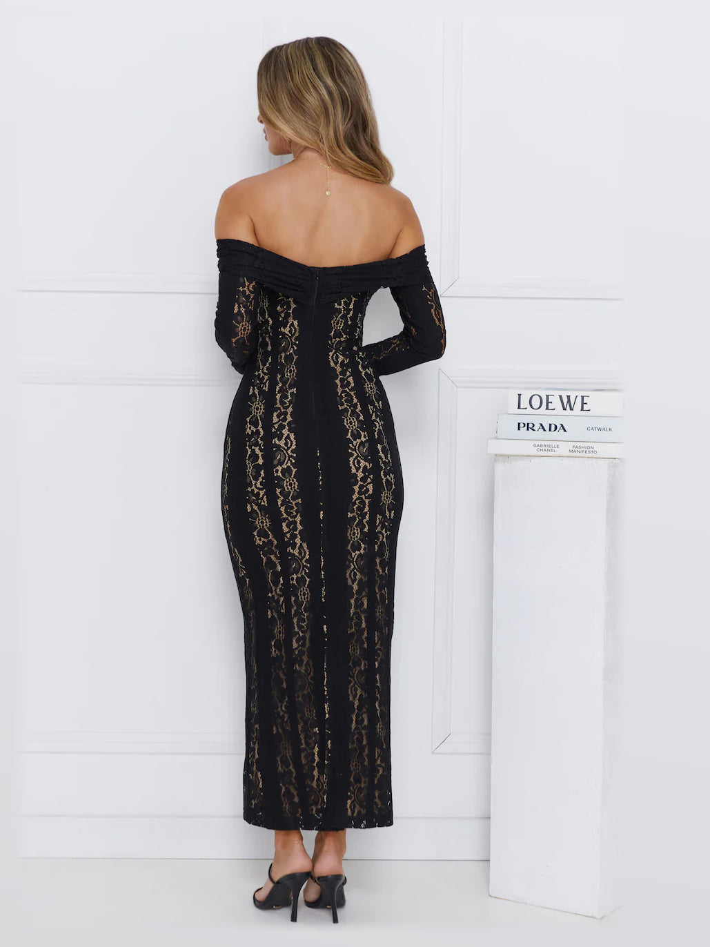 Black midi formal dress, back full-length view showing the bodice