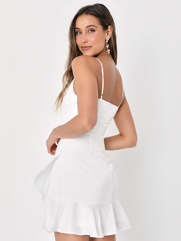 White satin mini dress, side view, spaghetti straps and layered ruffle skirt