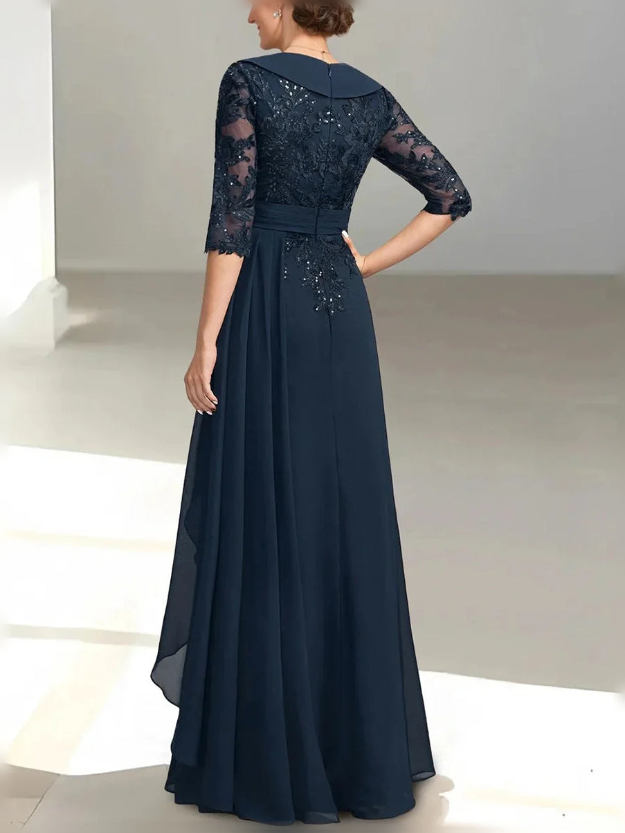 Dark blue V-back sequin A-line gown with sheer lace sleeves and draped chiffon panel