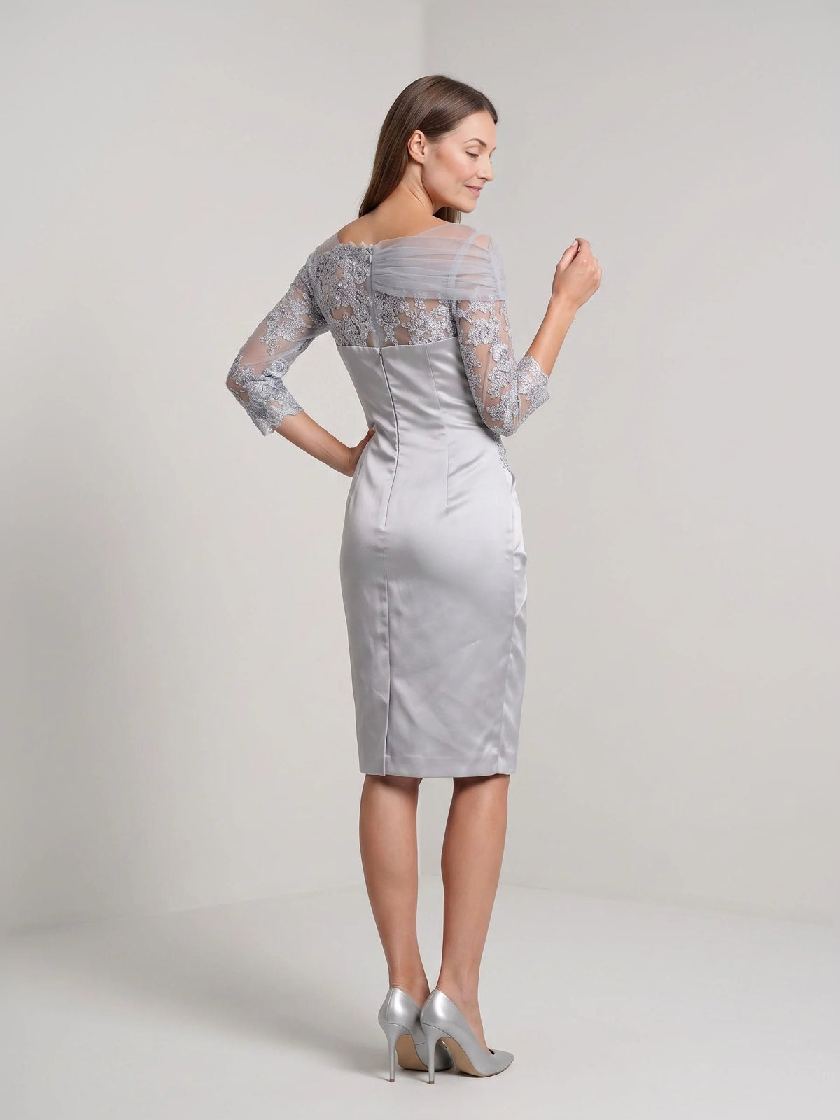 Silver knee-length sheath dress, ruched off-shoulder, lace sleeves, side/back view