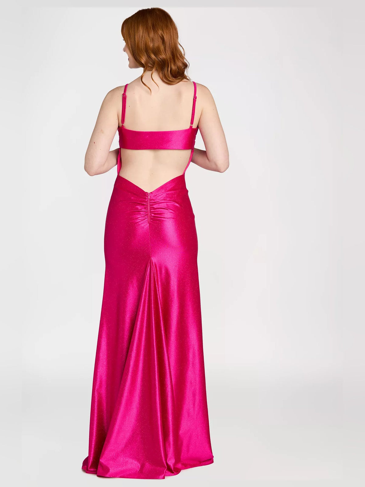 Fuchsia satin maxi prom dress with ruched bodice and thin crisscross back straps