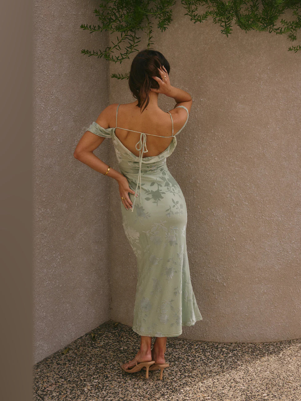 Green midi formal dress, back full-length view showing the bodice