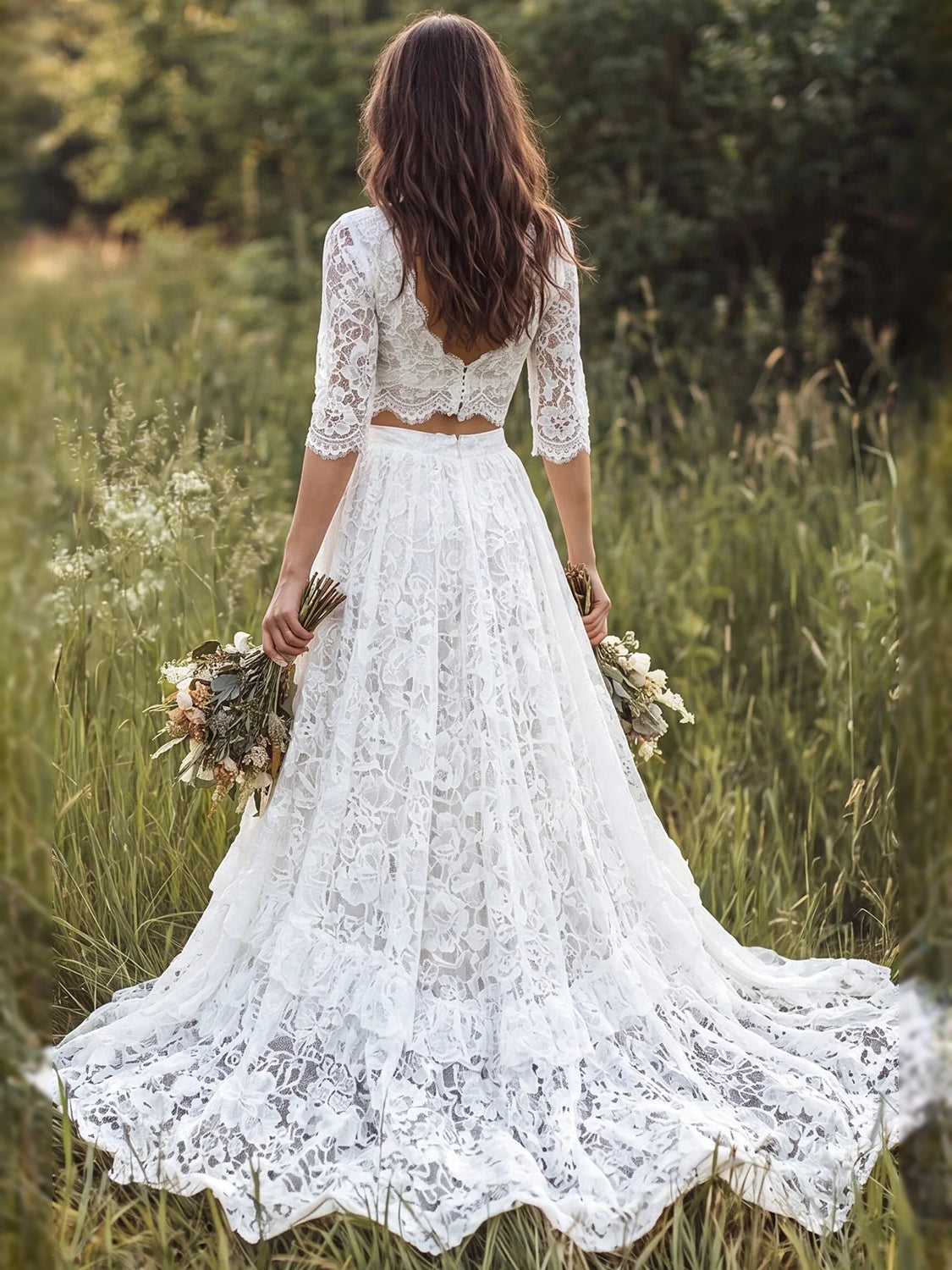 Ivory lace tiered A-line maxi wedding dress with open back and 3/4 sleeves