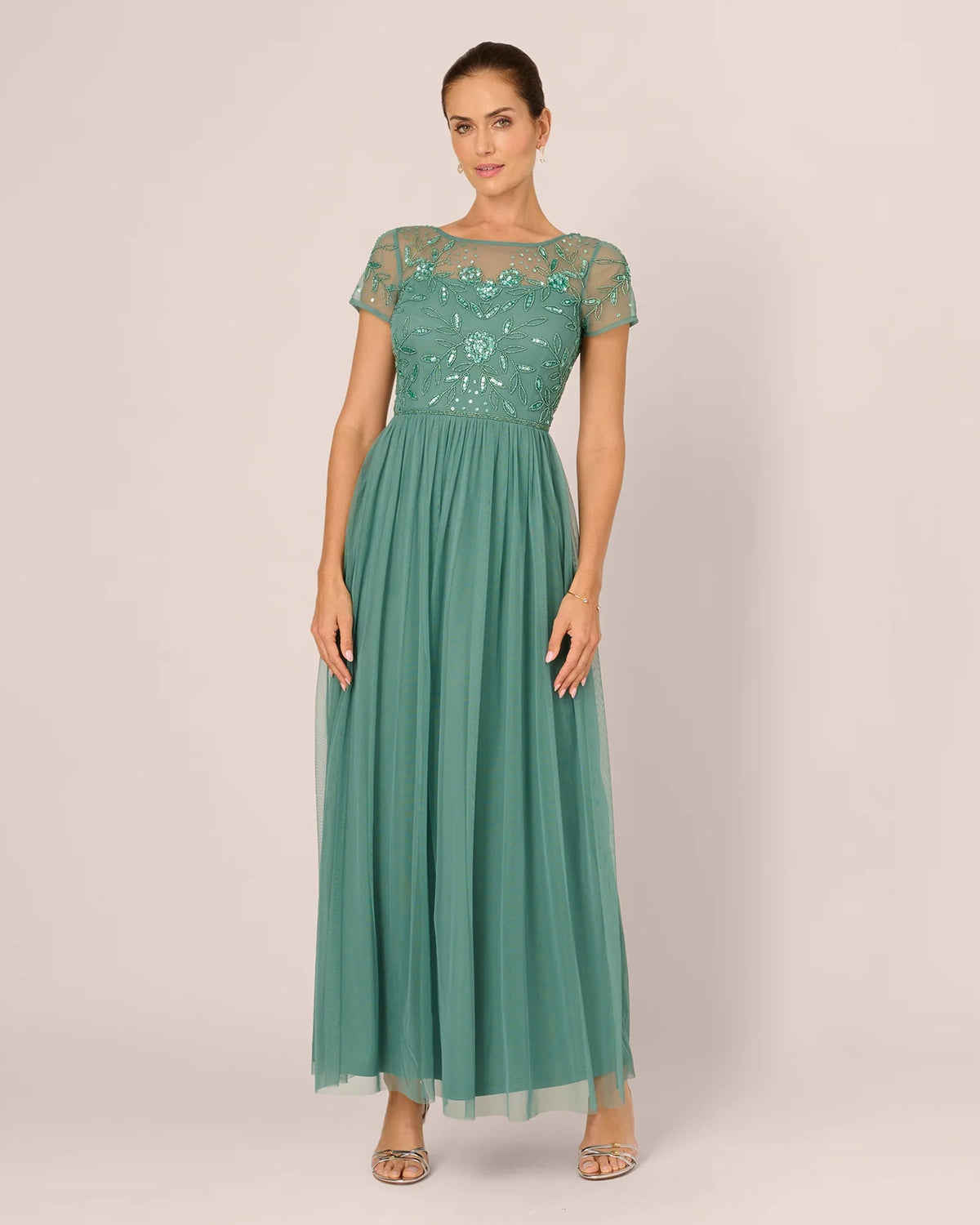 Seafoam green A-line maxi dress with short sleeves and beaded neckline detail