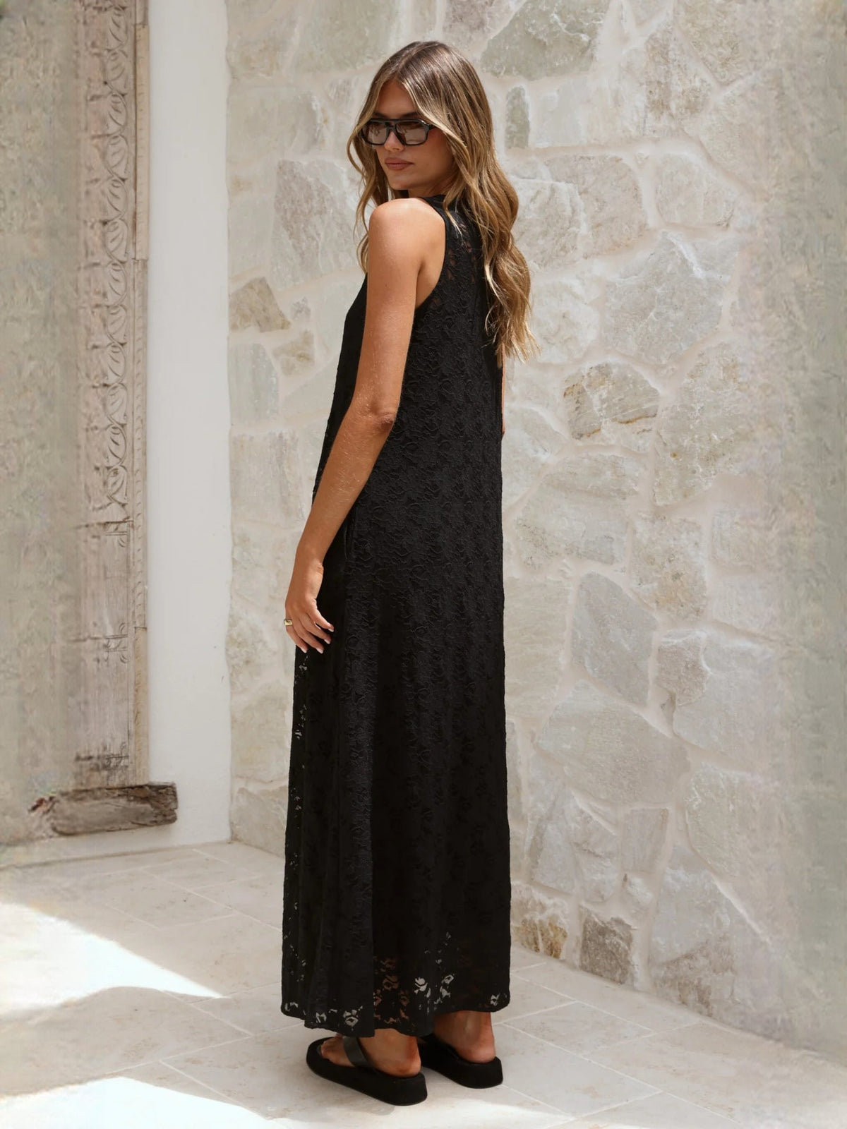 Black a-line maxi formal dress with a-line, full-length back view