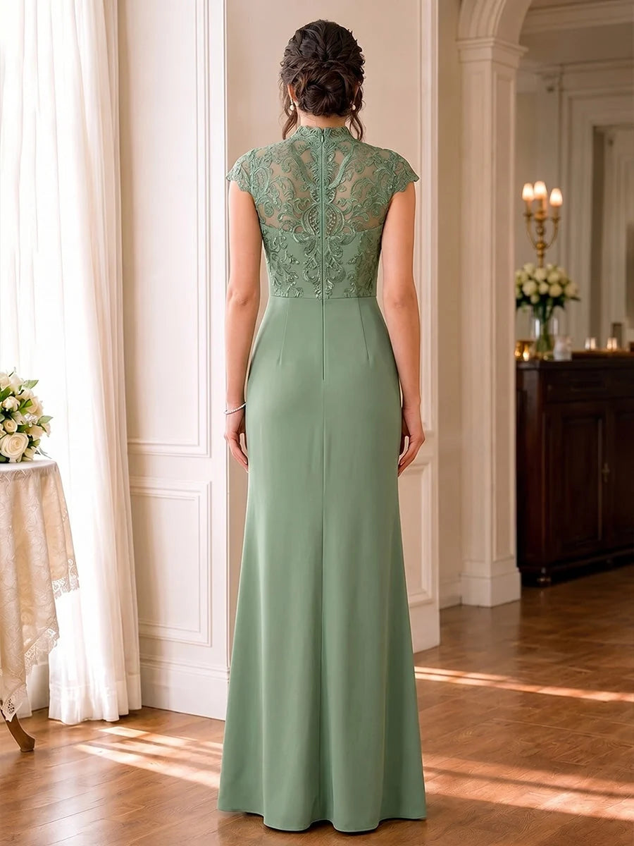 Back view of dusty sage high-neck maxi dress with cap sleeves and floral lace yoke