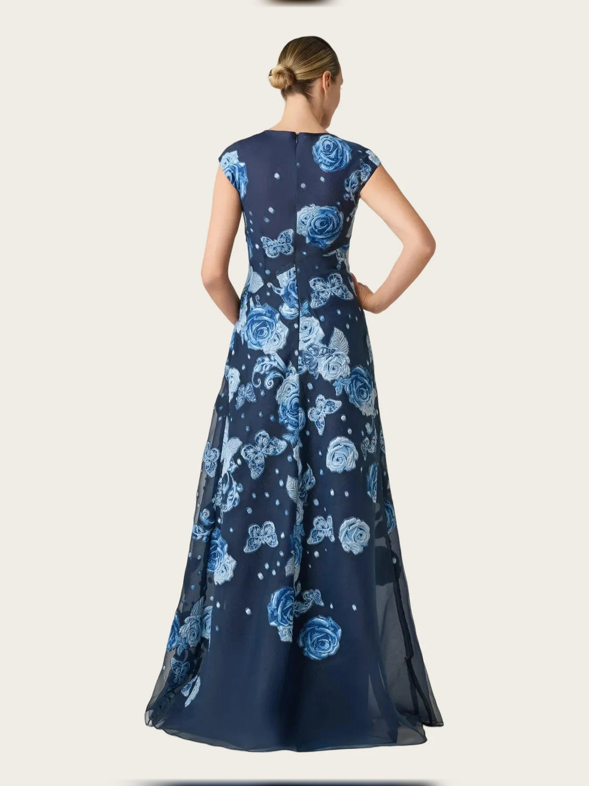 Navy A-line maxi dress with cap sleeves, round back, and blue rose floral pattern
