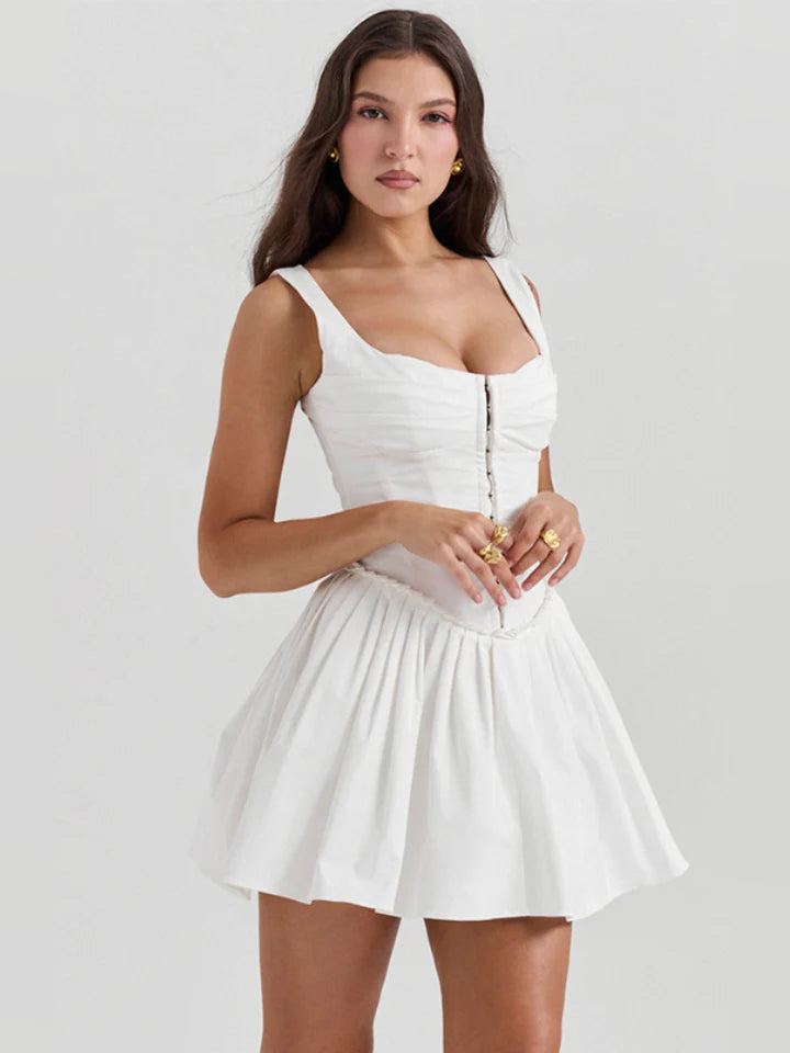 White pleated mini dress with square neckline and vertical corset paneling