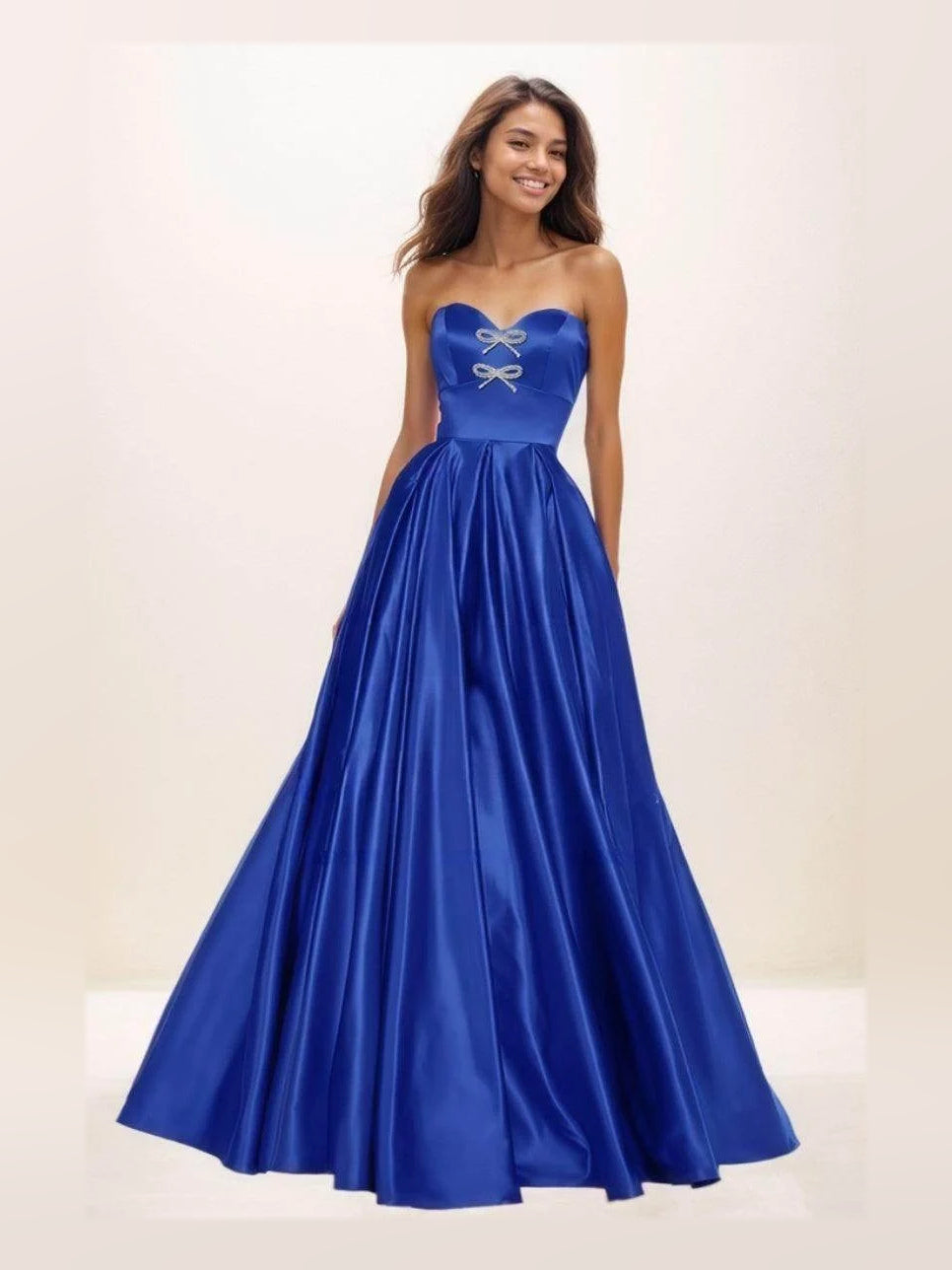 Royal blue satin sweetheart A-line prom dress with corset bow at bodice