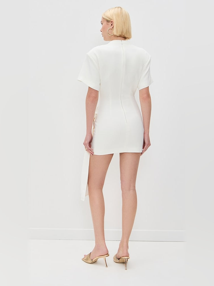 White mini dress, back view, short sleeves and center back seam