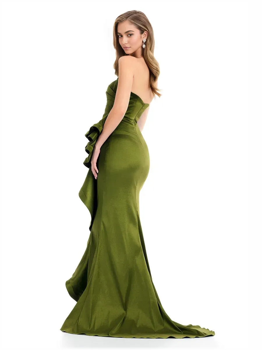 Olive green strapless floor-length gown with draped ruching and ruffle overlay