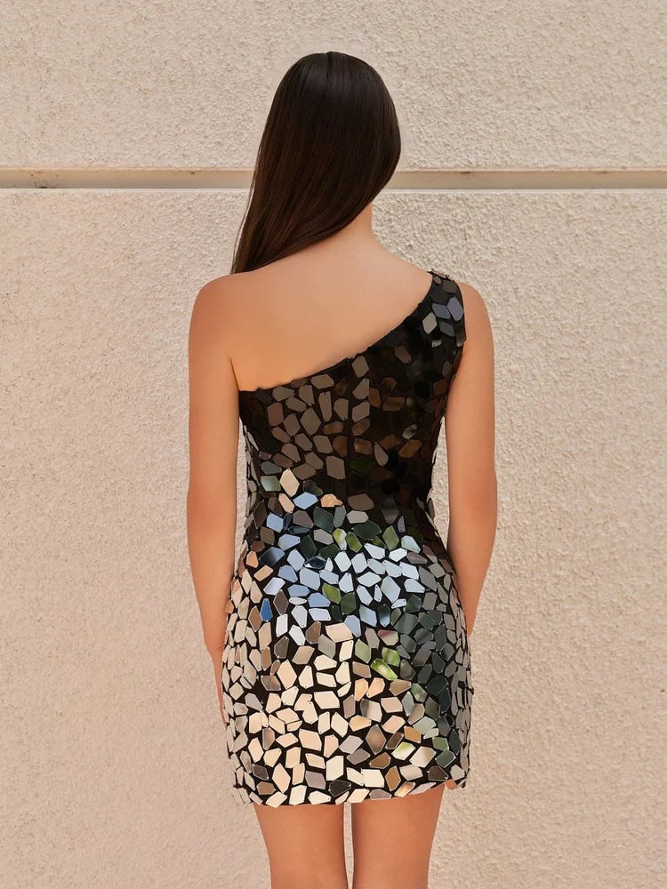 Back view of one-shoulder sequin mini sheath dress, black with silver mosaic tiles