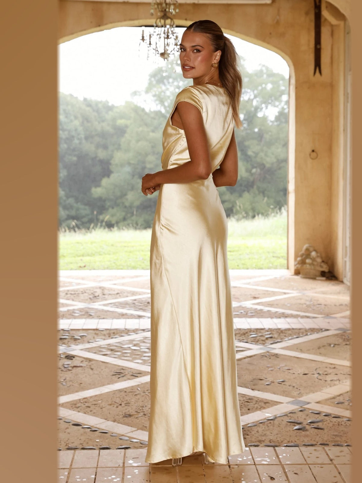 Yellow maxi formal dress, back full-length view showing the bodice