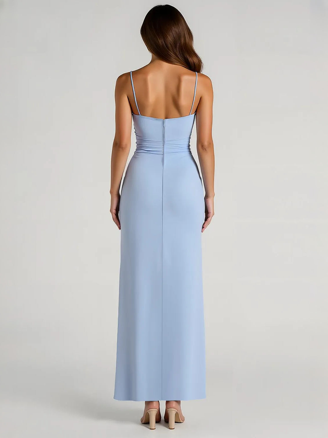 Light blue satin maxi sheath dress with open back, thin straps, and high slit