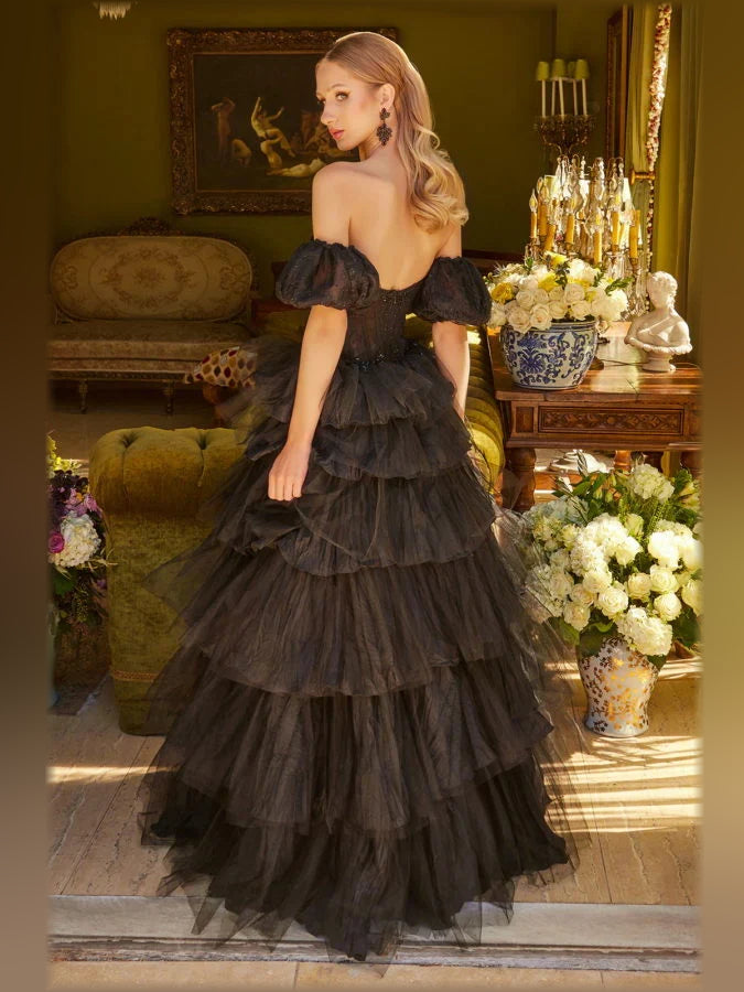 Black off-shoulder corset dress side profile, tiered ruffle skirt and short puff sleeves