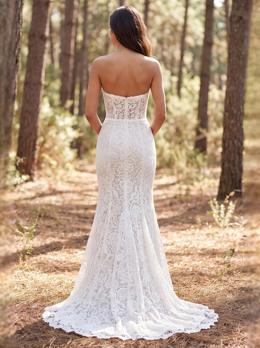 Ivory strapless lace mermaid wedding dress, open back, with ruffled chiffon overlay