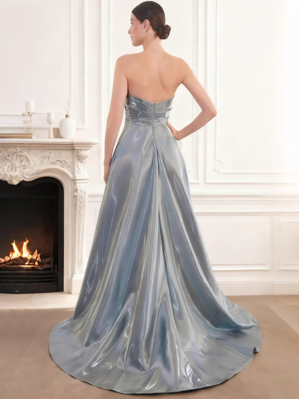 Dusty blue satin formal dress with strapless open back and pleated A-line skirt