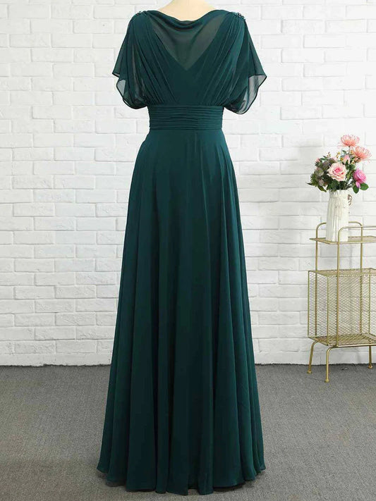 Peacock cowl-neck formal dress with ruched waist and flowing pleated skirt, short sleeves