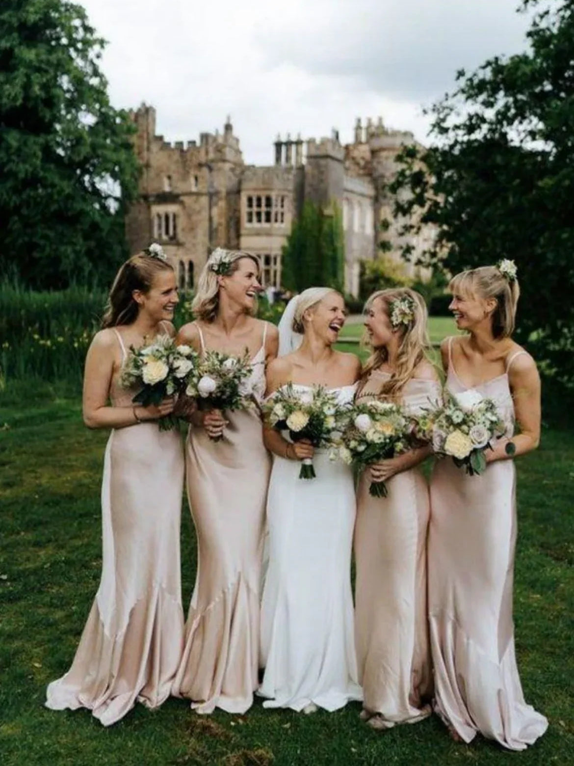 Champagne satin V-neck sheath bridesmaid dress, sleeveless, floor-length, side view