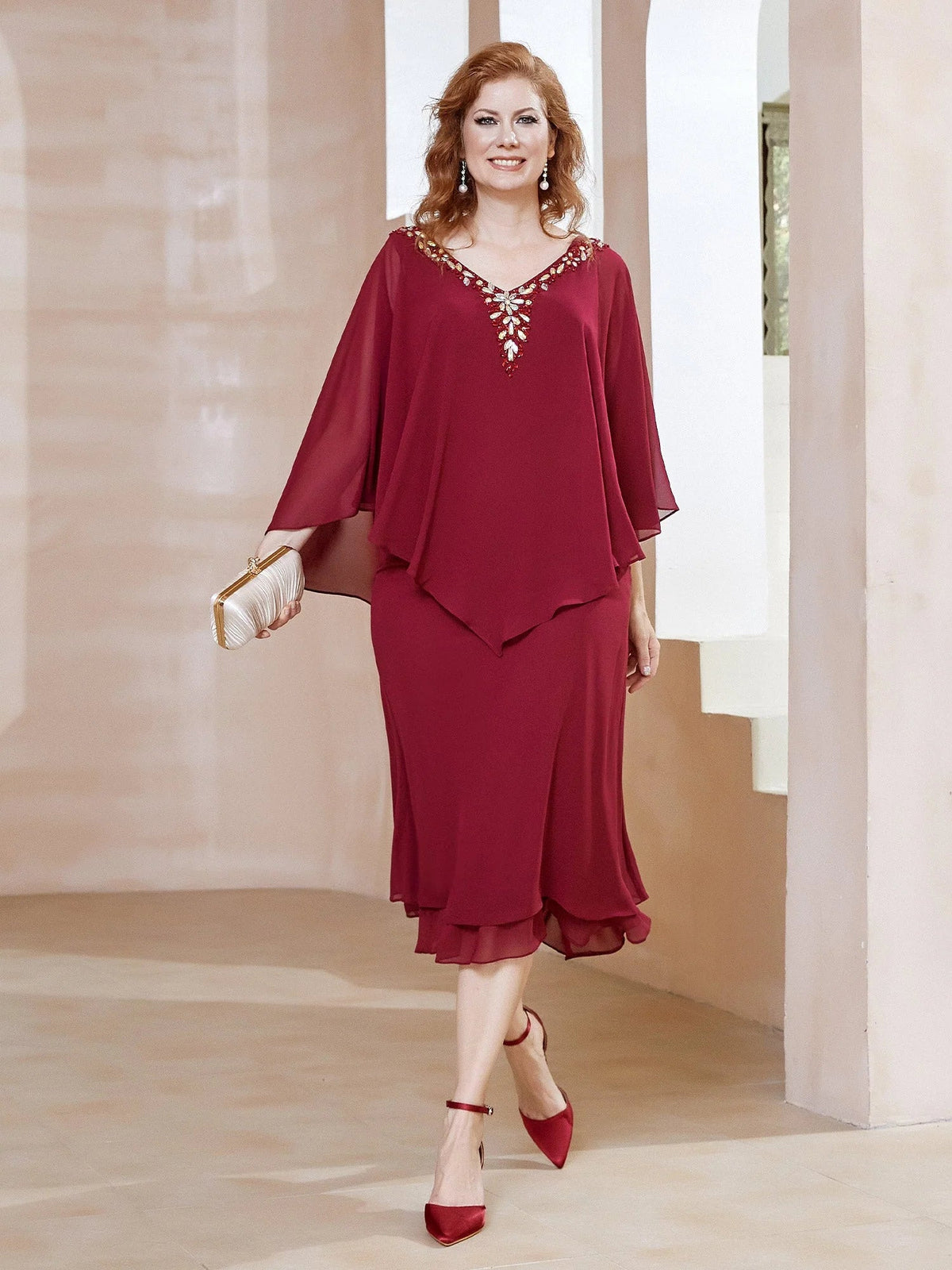 Burgundy V-neck midi dress with chiffon cape sleeves and layered skirt hem