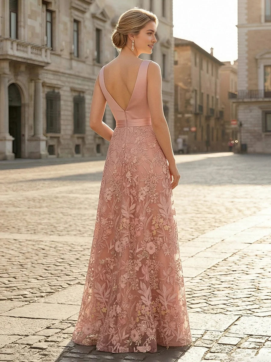 Blush pink embroidered floral maxi dress with cross-back straps and V-back