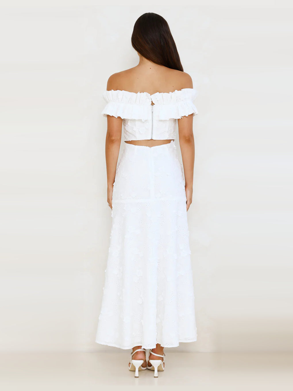 White off-the-shoulder ruffle maxi dress, back view, with center seam detail