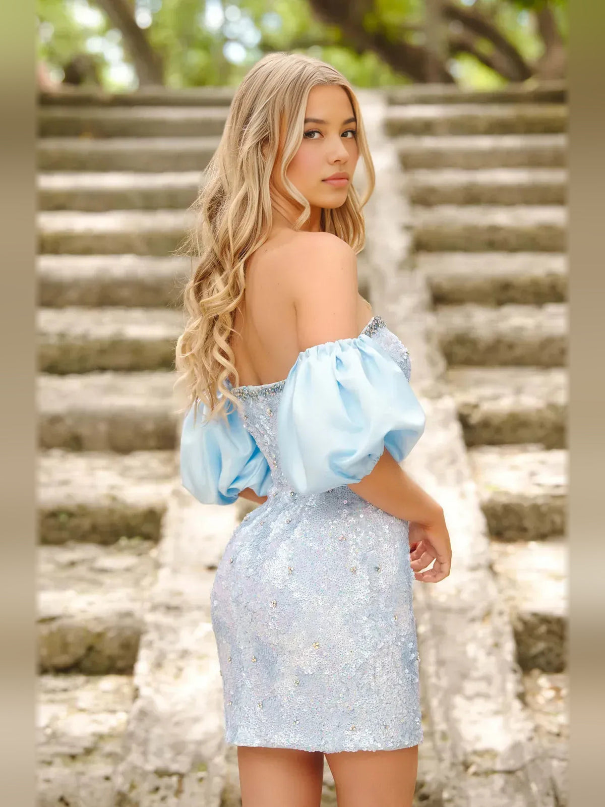 Sky blue strapless mini dress with off-shoulder puff sleeves and allover sequins