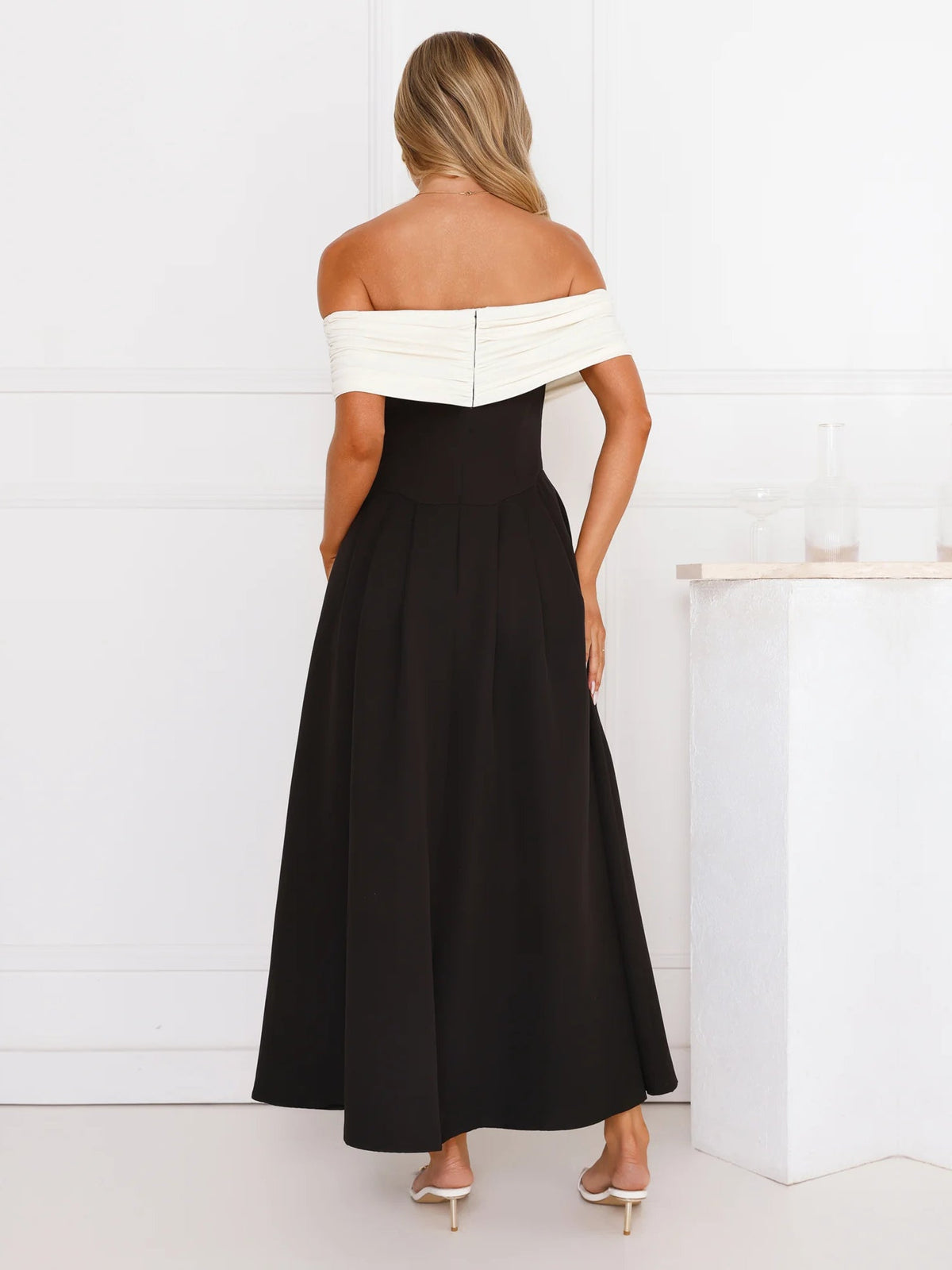 Black a-line maxi formal dress with a-line, full-length back view