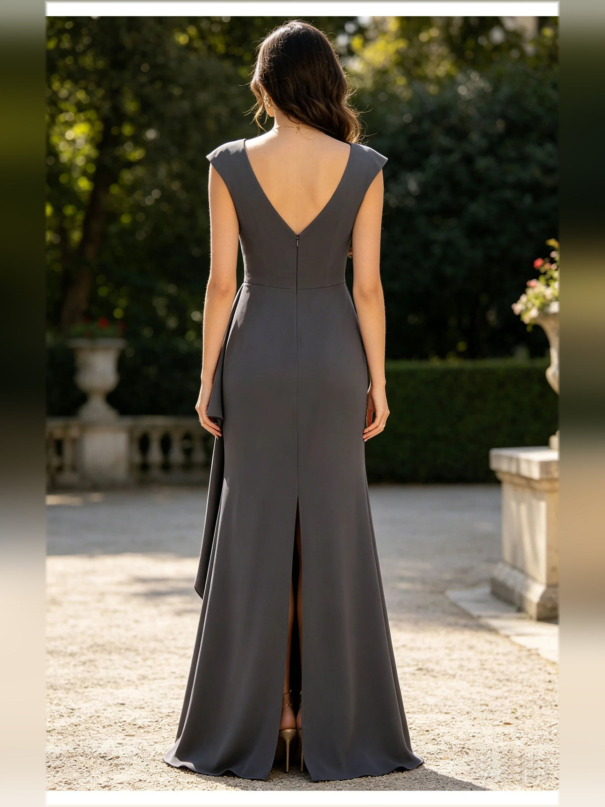 Gray V-back formal dress with cap sleeves, pleated bodice and floor-length skirt