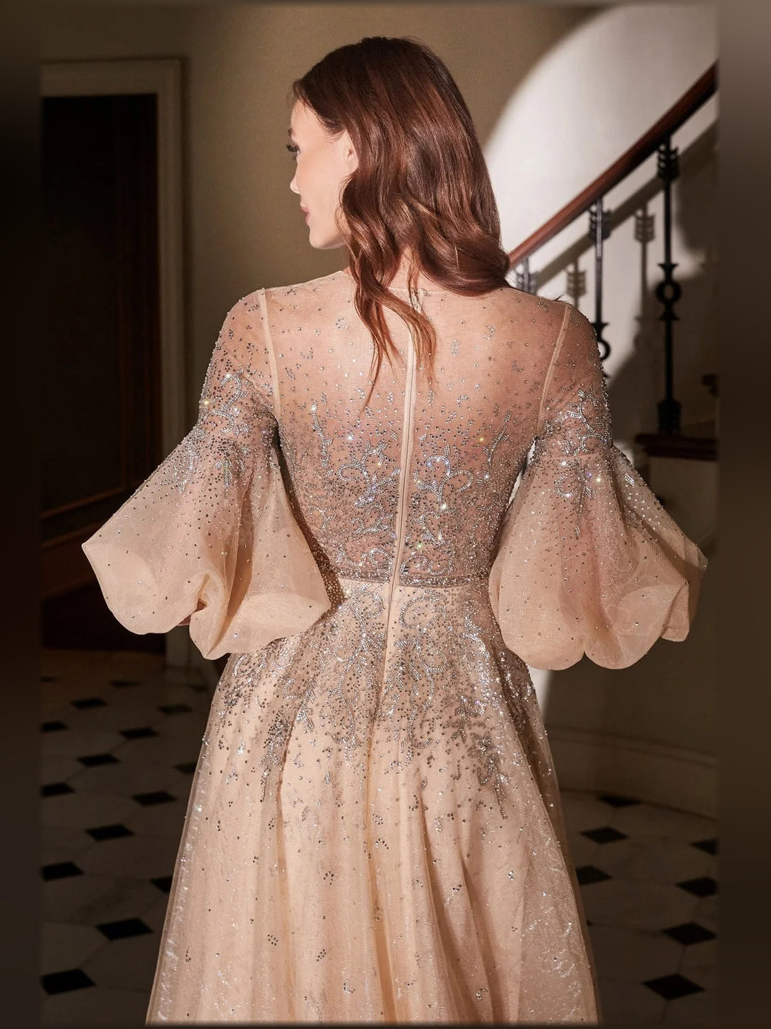 Champagne beaded A-line formal dress, back view with puff sleeves