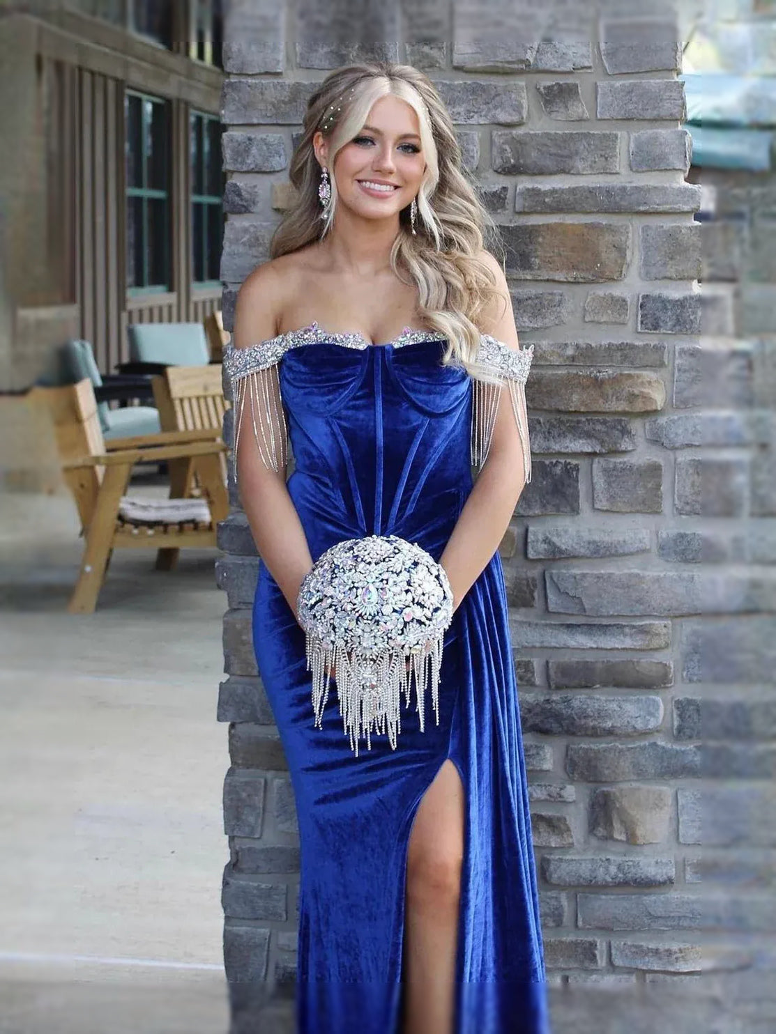 Royal blue velvet sweetheart prom dress with ruched bodice and rhinestone fringe detail