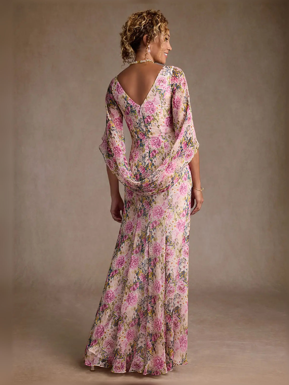 Floral draped chiffon sheath dress, low open back and three-quarter cape sleeves