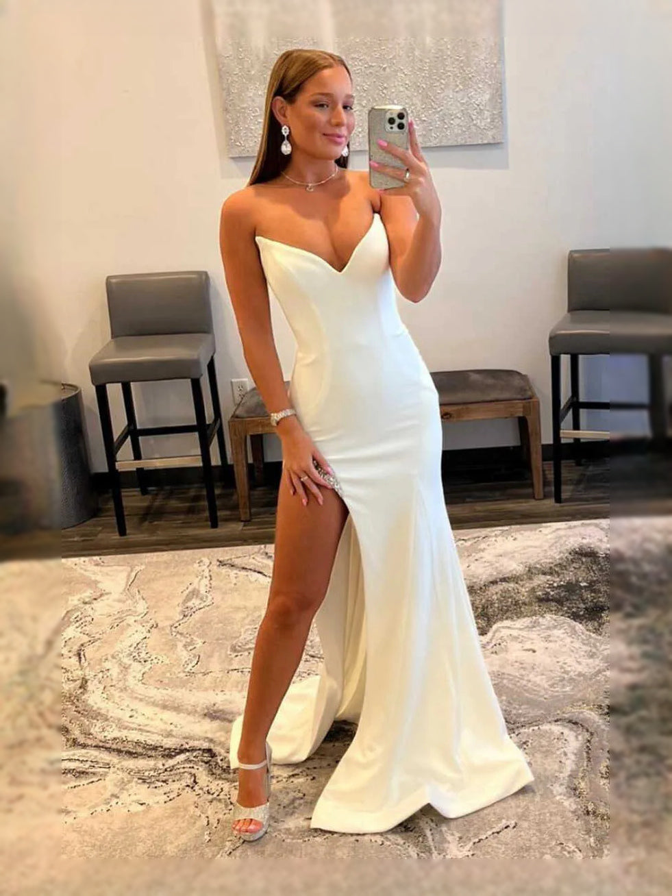 White satin sweetheart mermaid prom dress with V neckline, side slit, and fitted trumpet skirt