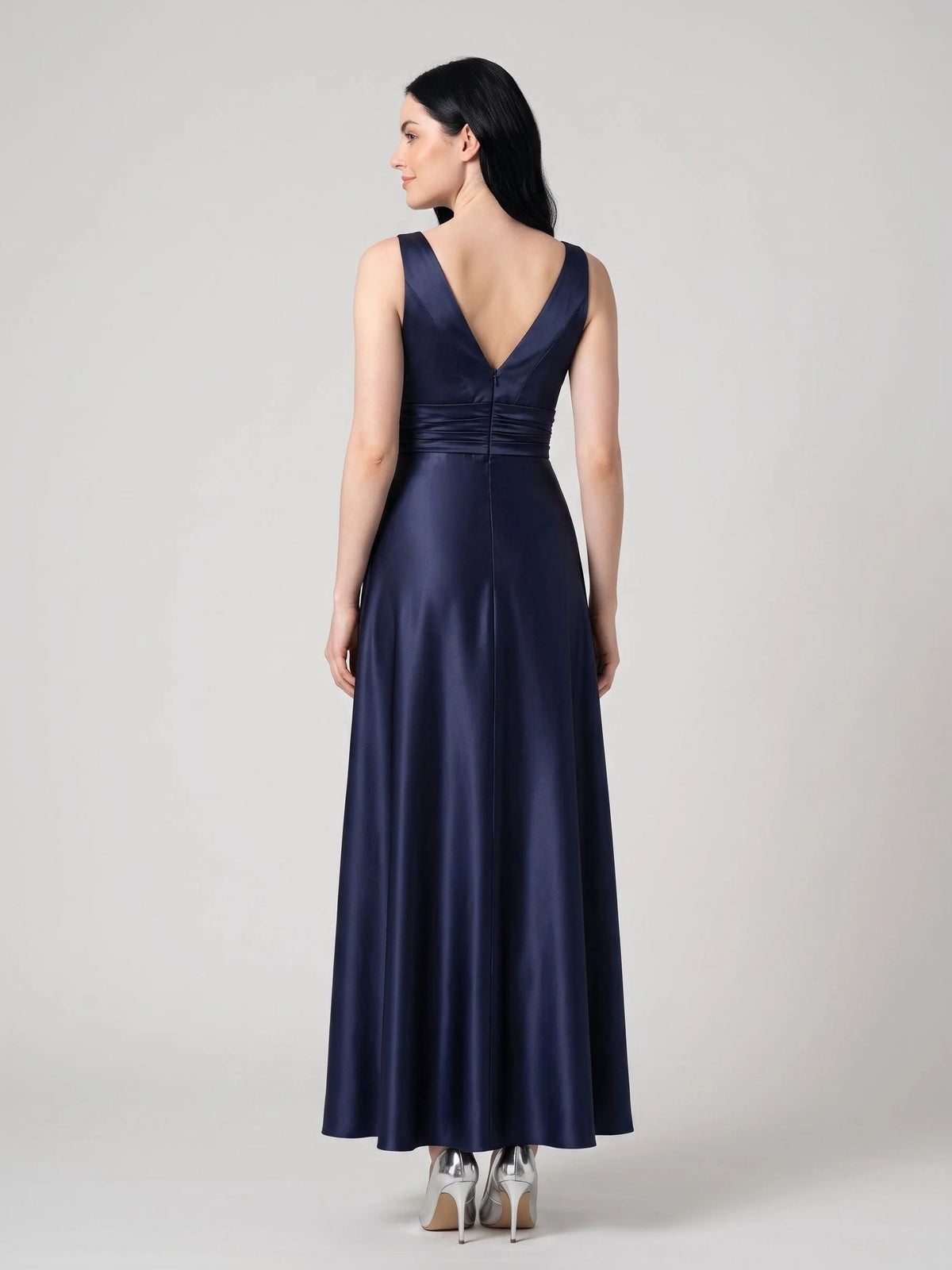 Dark blue satin sleeveless V-neck ruched A-line floor-length dress, side/back view