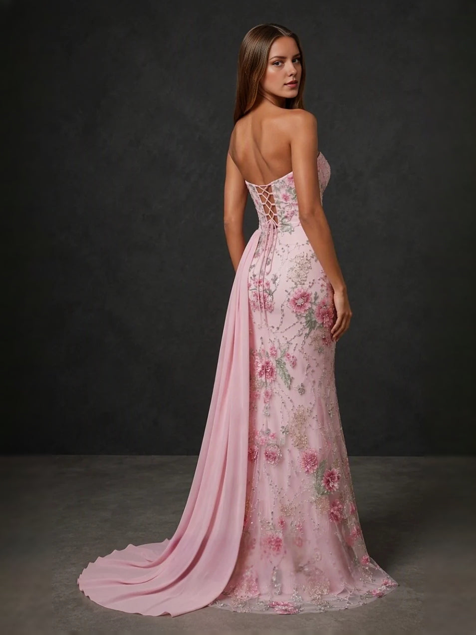 Blush pink strapless floral mermaid gown with open lace back and draped train