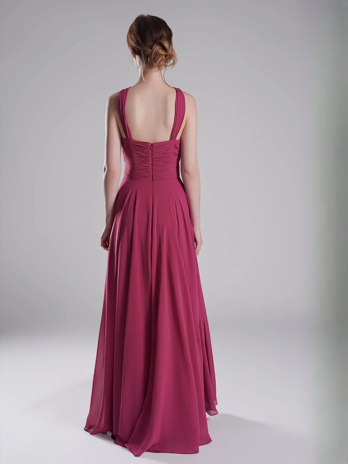 Fuchsia ruched halter A-line chiffon bridesmaid dress with open back and gathered waist