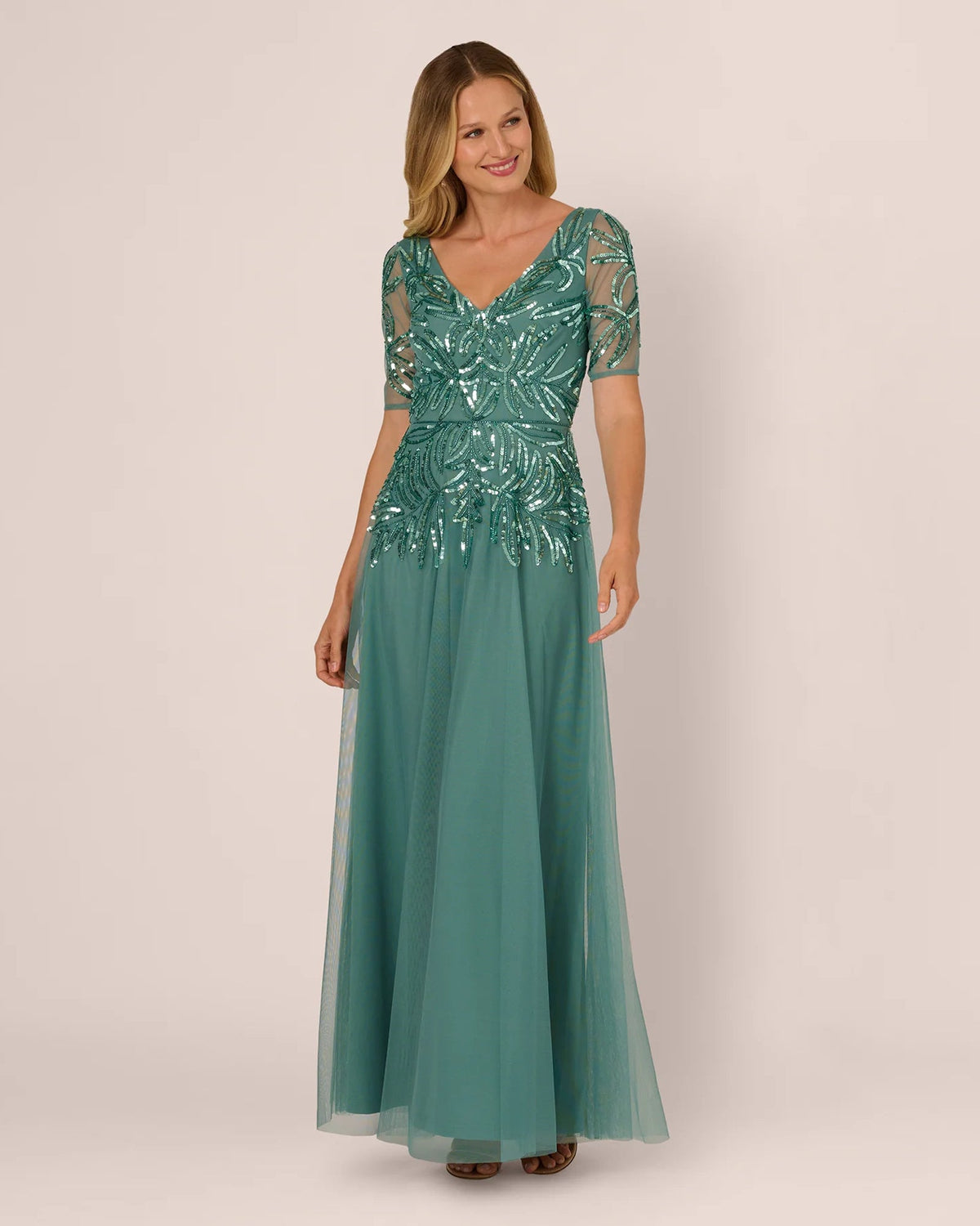 Teal A-line maxi dress with V-neck, short sleeves, and silver sequin embroidery