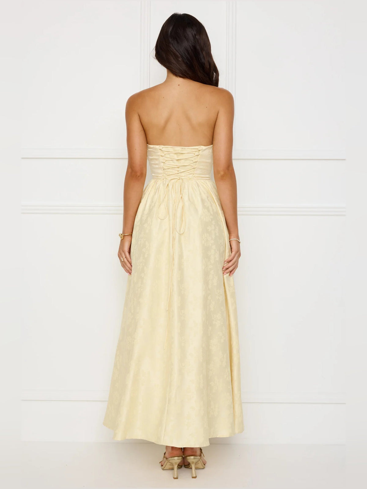 Yellow a-line maxi formal dress with a-line, full-length back view