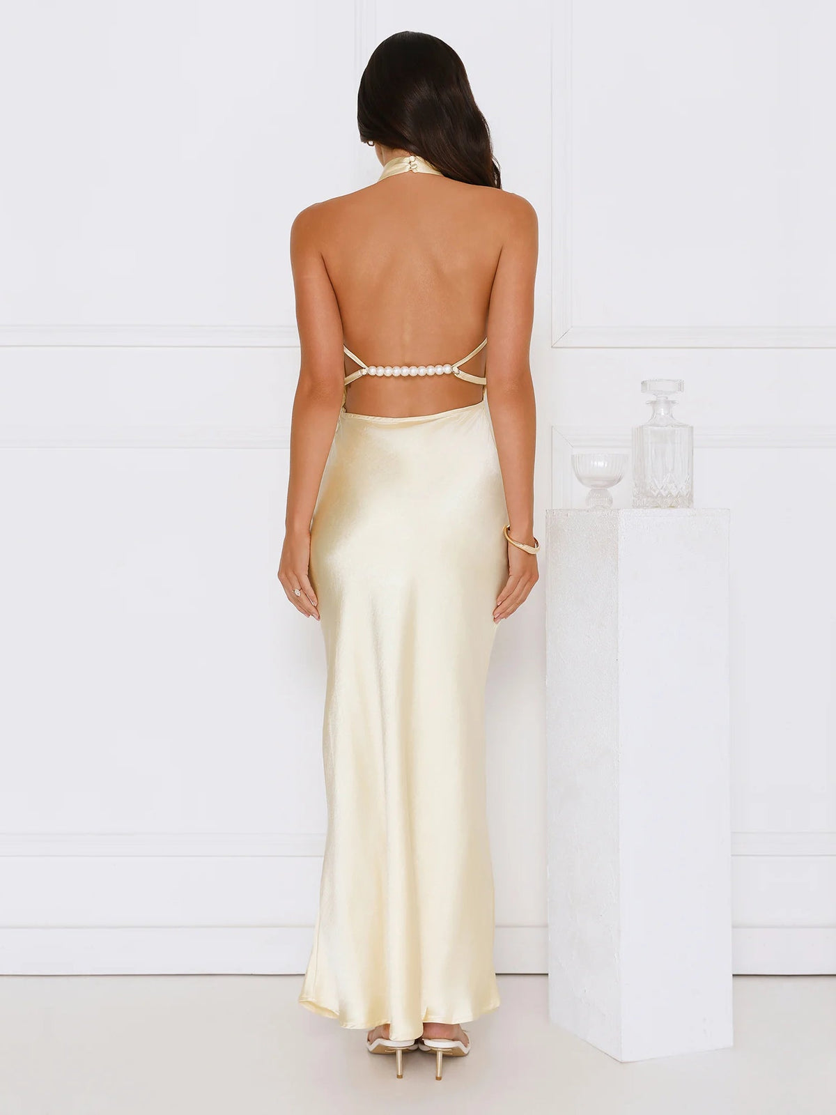 Yellow sheath maxi formal dress with open back, full-length back view