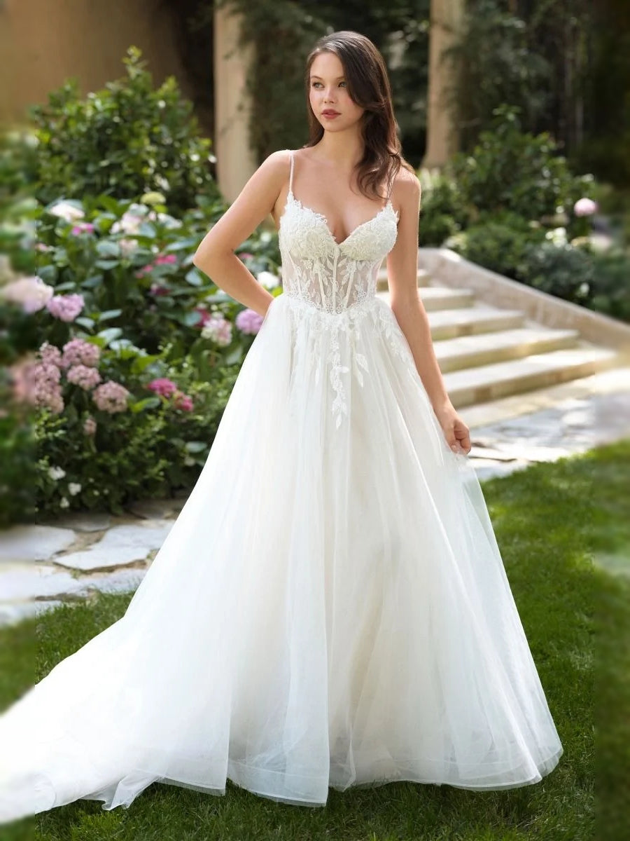 Ivory lace corset wedding dress with layered tulle A-line skirt and V-neck bodice