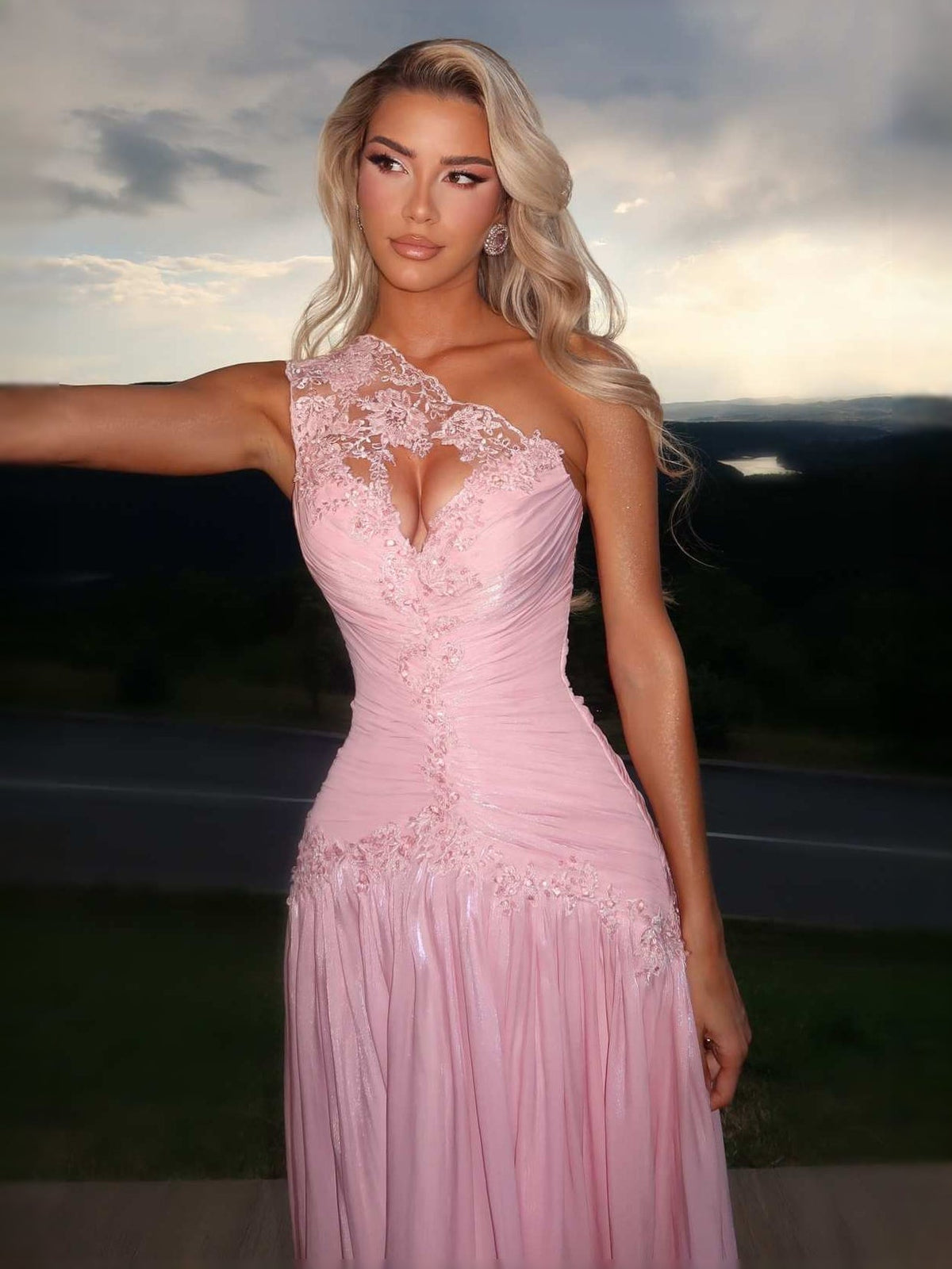 One-shoulder pink ruched A-line prom dress with lace appliqué and floor-length skirt