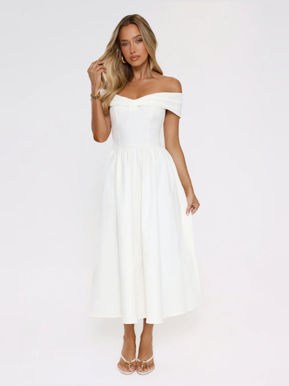 White off-shoulder midi dress with elastic neckline and gathered skirt