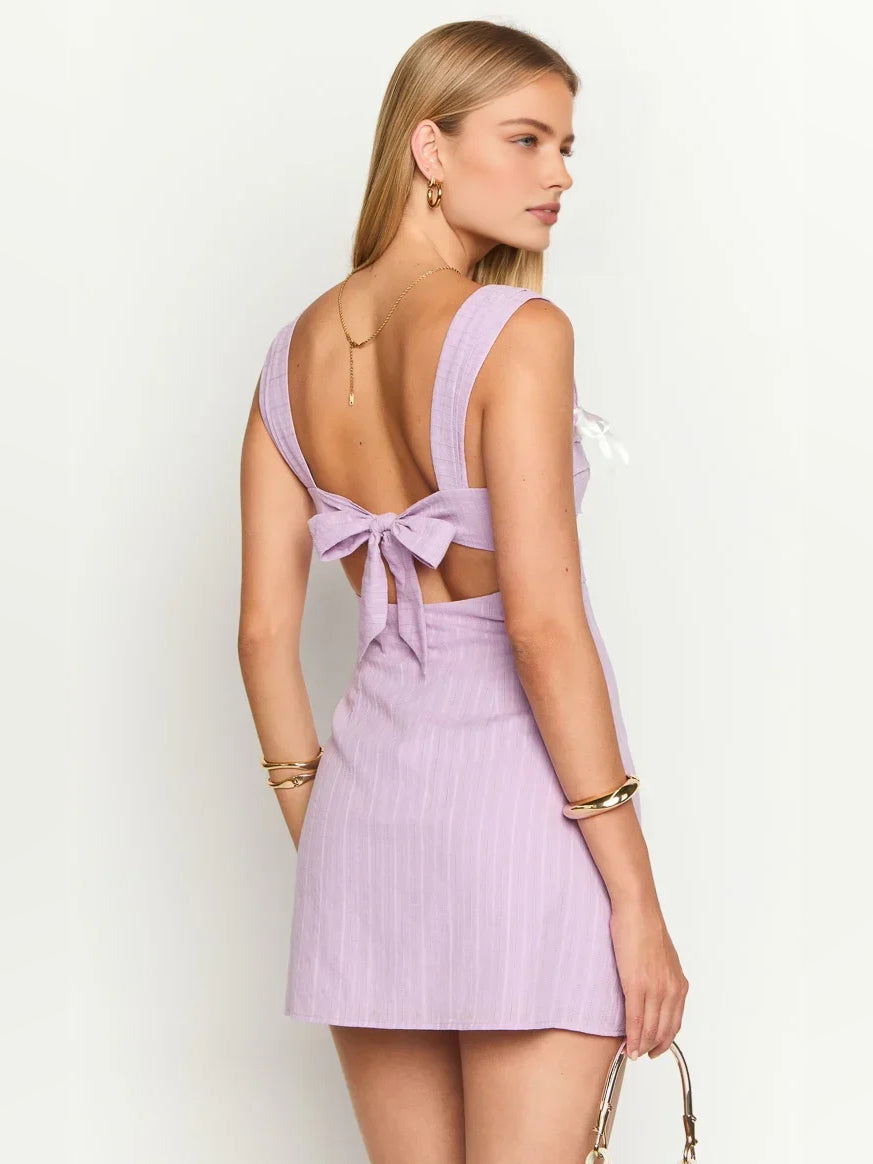 Lavender mini sheath dress, open back with bow ties and fitted skirt