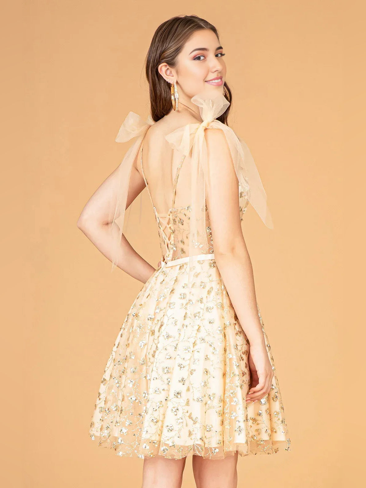 Champagne floral corset back mini tulle dress with bow straps and tied back