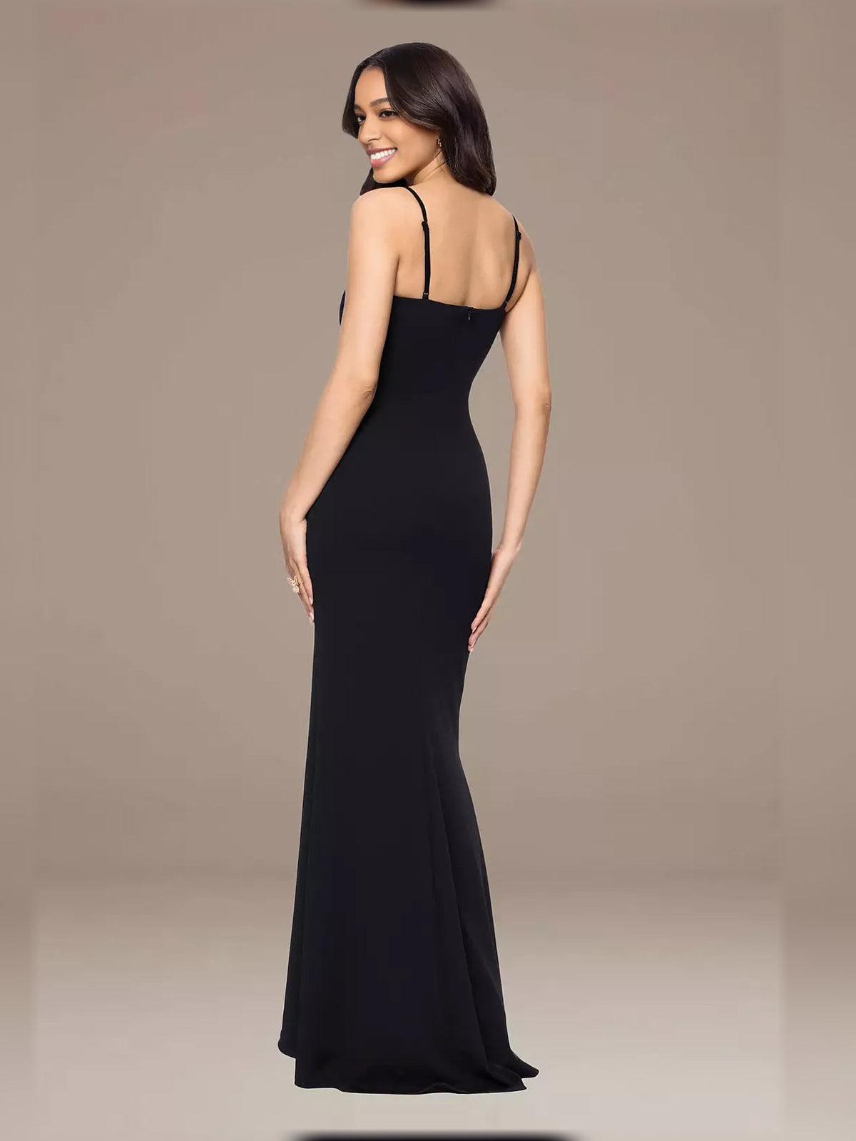 Black spaghetti-strap mermaid maxi formal dress, back view with fitted bodice